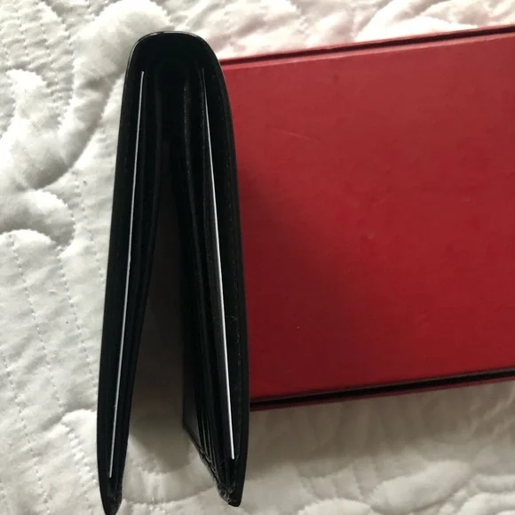 Authentic Salvatore Ferragamo Black Leather wallet - Picture 9 of 11